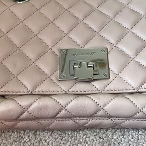 Michael Kors blush pink quilted leather bag.